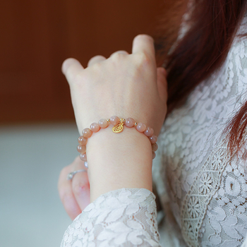 Narukvica sa sunčevim kamenom, bakreno pozlaćena, ručno pletena, model YGSL11-01