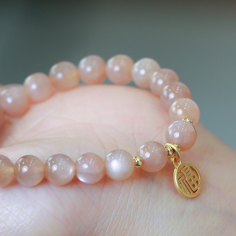 Narukvica sa sunčevim kamenom, bakreno pozlaćena, ručno pletena, model YGSL11-01