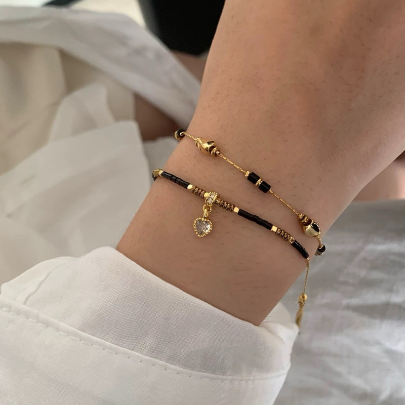 Narukvica od obsidijana, ručno izrađena Byg, ženski stil, personalizirani trend