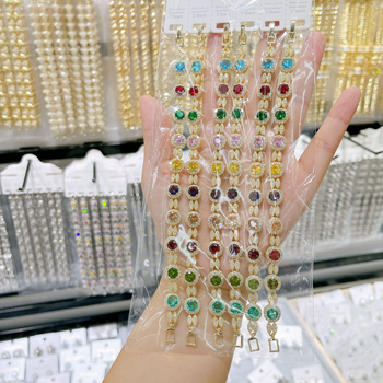 Karkötő kerek cirkónekkel, kapocs teljes cirkónokkal, réz bevonattal