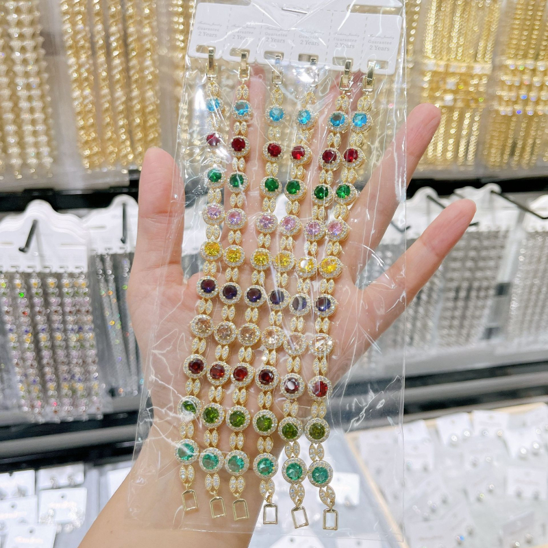 Karkötő kerek cirkónekkel, kapocs teljes cirkónokkal, réz bevonattal