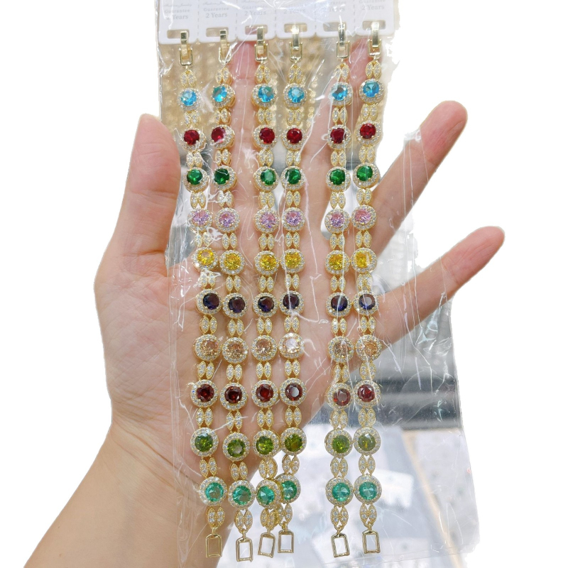 Karkötő kerek cirkónekkel, kapocs teljes cirkónokkal, réz bevonattal