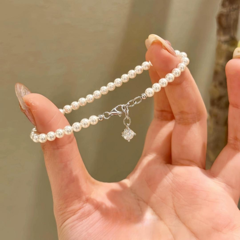 Narukvica od srebra 925 s perlom i privjeskom od cirkonu, minimalistički elegantan dizajn
