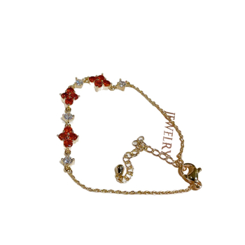 Virág alakú karkötő, arannyal bevont réz, valódi aranyozás, női könnyed luxus stílusú kézre szánt ékszer