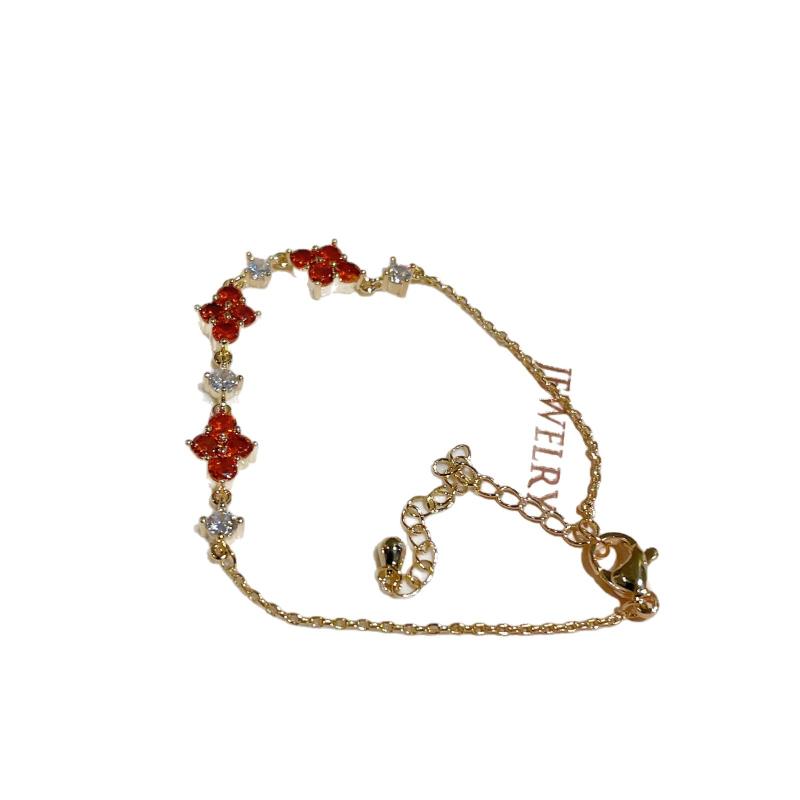 Virág alakú karkötő, arannyal bevont réz, valódi aranyozás, női könnyed luxus stílusú kézre szánt ékszer