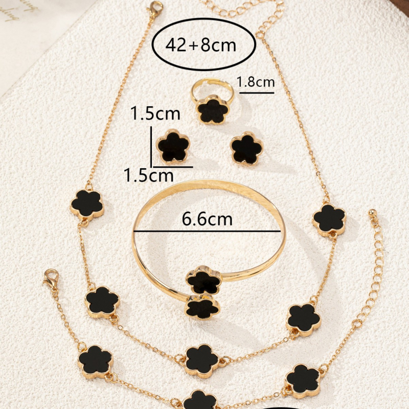 Set de bijuterii: cercei, colier și brățară cu motiv trifoi cu patru foi; material: aliaj de zinc; finisaj: electroplacare; material pandant: aliaj; lanț: lanț obișnuit