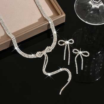 Set de bijuterii din cupru ecologic, cu bow tassel din rhinestone și lanț claw chain – cercei și colier