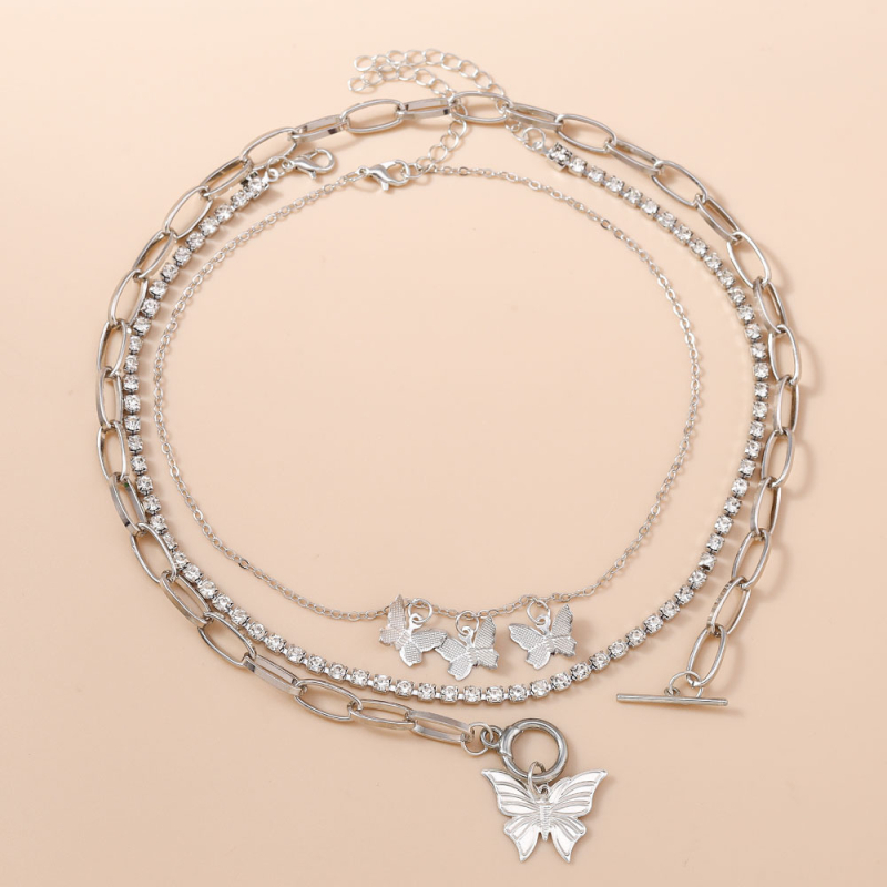 Set ogrlice s rhinestones i leptirovim motivom, debelim lancem; materijal: cinkova zlitina; završna obrada: elektropliranje; tip: ogrlica