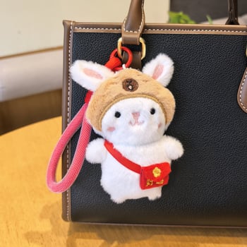 Csörgős plüssnyuszi táskadísz és kulcstartó — rajzfilmszerű, aranyos motívumokkal