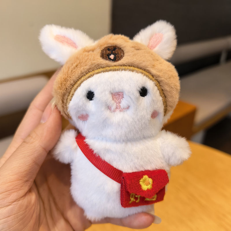 Csörgős plüssnyuszi táskadísz és kulcstartó — rajzfilmszerű, aranyos motívumokkal