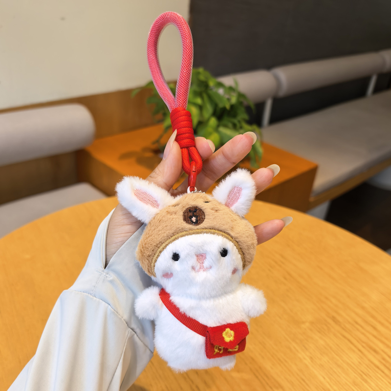 Csörgős plüssnyuszi táskadísz és kulcstartó — rajzfilmszerű, aranyos motívumokkal