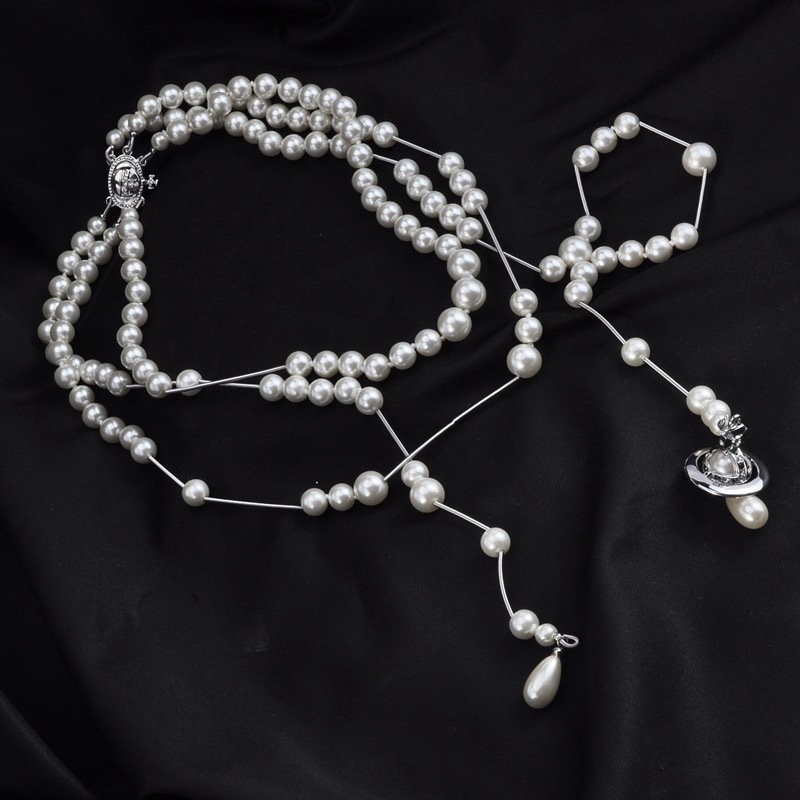 Dugačko geometrijsko ogrlica od legure, bakrenim privjeskom, križnim lancem, elektroplatiranje; proljeće 2025; svjež i sladak stil