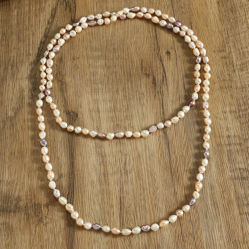 Extrahosszú csomós édesvízi gyöngy nyaklánc, 81 cm felett, 7–8 mm gyöngyök, réz alkatrészek