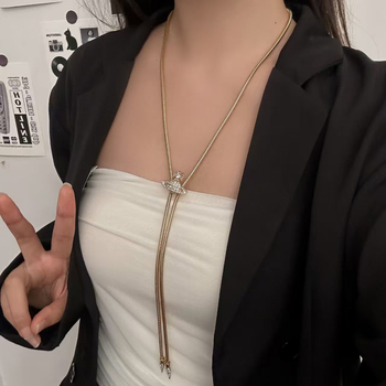 Titāna tērauda džemperķēde, gara ģeometrijiska kaklarota; kulons no nerūsējošā tērauda; iekšējā ieliktnis ar mākslīgajiem akmeņiem