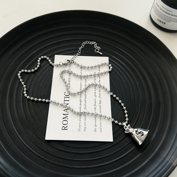 Ogrlica s trodimenzionalnim privjeskom novčane vrećice, lanac od titan čelika i bakrene legure, duljina 51–60 cm, elektroplakirani, unisex