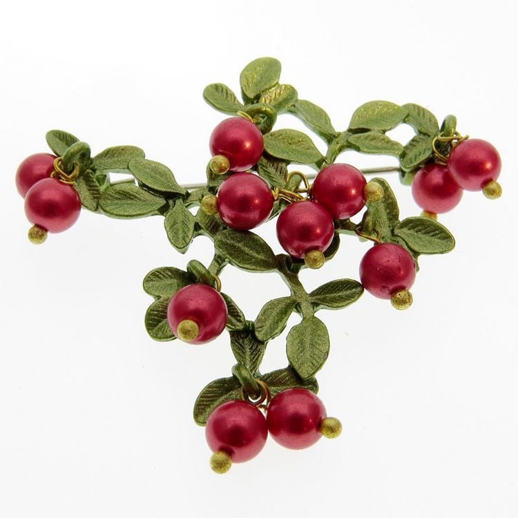 Брошка от сплав с флорален мотив, покрита с изпичано покритие и антиотразяваща функция