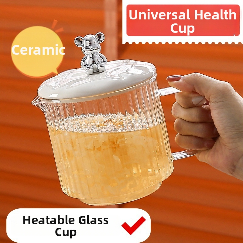 Veselības tējas kanna no stikla ar smilšu tekstūras korpusu (1 L ietilpība; 220 V; 300–350 W; keramikas iekšējā tvertnes; šķidruma izplešanās termostats)