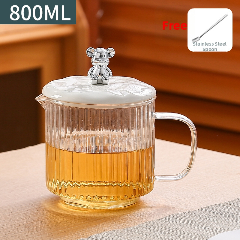 Veselības tējas kanna no stikla ar smilšu tekstūras korpusu (1 L ietilpība; 220 V; 300–350 W; keramikas iekšējā tvertnes; šķidruma izplešanās termostats)