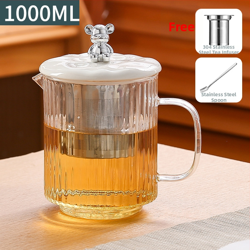 Veselības tējas kanna no stikla ar smilšu tekstūras korpusu (1 L ietilpība; 220 V; 300–350 W; keramikas iekšējā tvertnes; šķidruma izplešanās termostats)