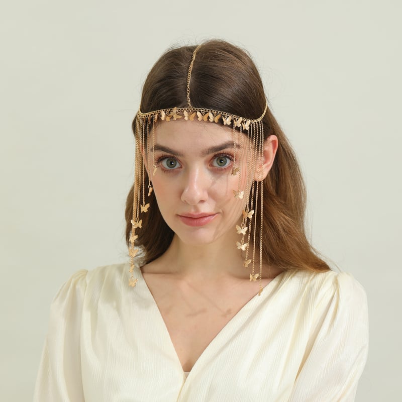 Ötvözetből készült hajdísz tollakkal és pillangó medállal, bohem menyasszonyi hajpánt • Anyag: ötvözet • Stílus: elegáns, bojt • Feldolgozás: elektroplakolás • Csomagolás: egyenként csomagolt • Megjelenés: 2025 ősz