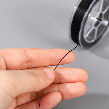 60 m crna pernata linija za kosu, elastična nit s perlicama, 0,4 mm