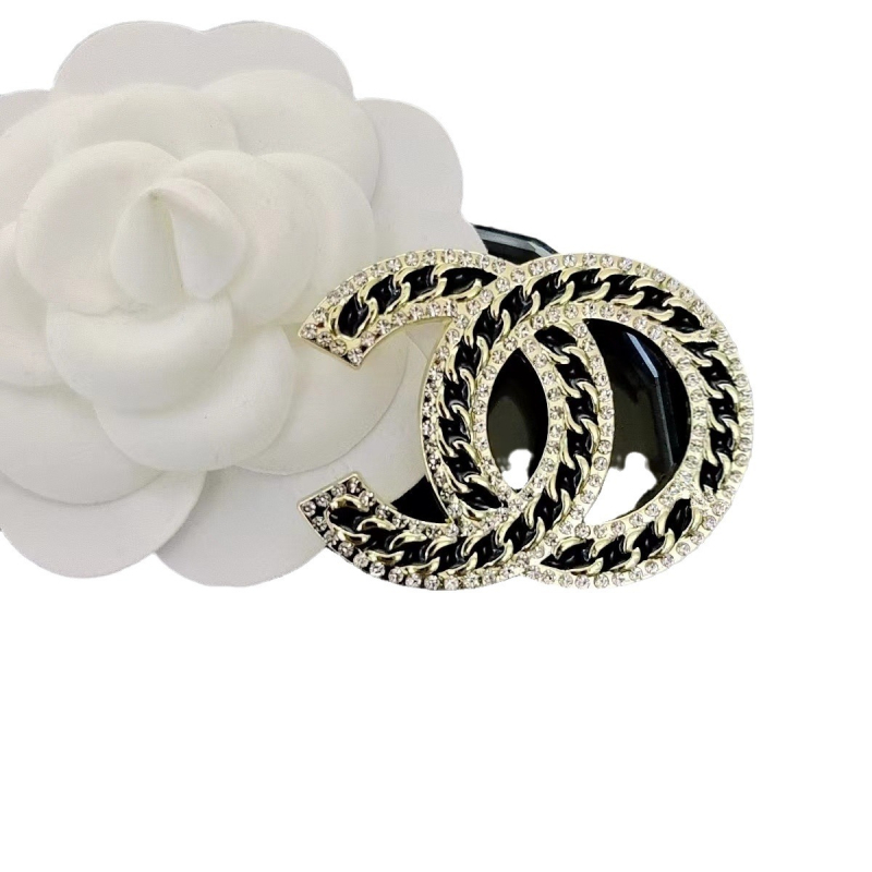 Broš od legure s natpisima, valovima i geometrijskim elementima, elektroplatiranje