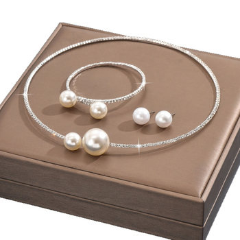 Set de bijuterii: colier pentru claviculă, cercei și brățară; cupru; pandantiv din rhinestones; formă U; lanț gheară