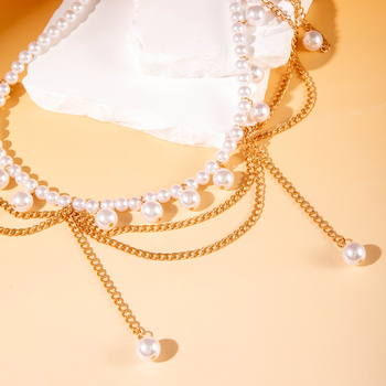 Dámska kovová opasná reťaz s perlami a strapcom – telo reťaz s geometrickým dizajnom