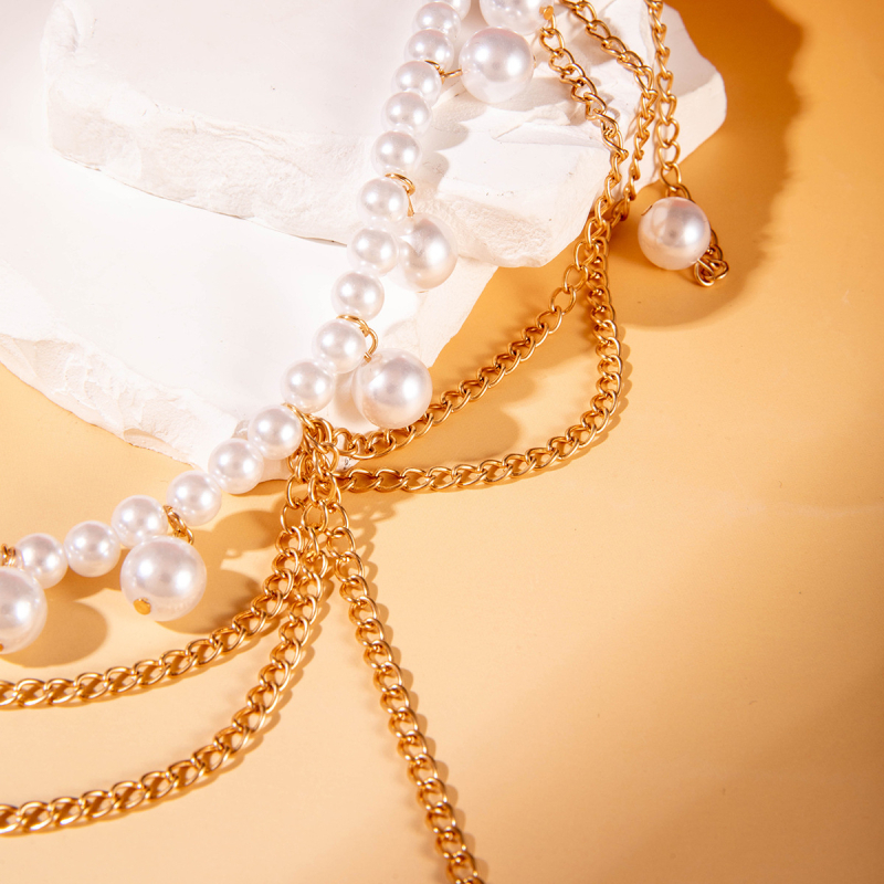 Dámska kovová opasná reťaz s perlami a strapcom – telo reťaz s geometrickým dizajnom