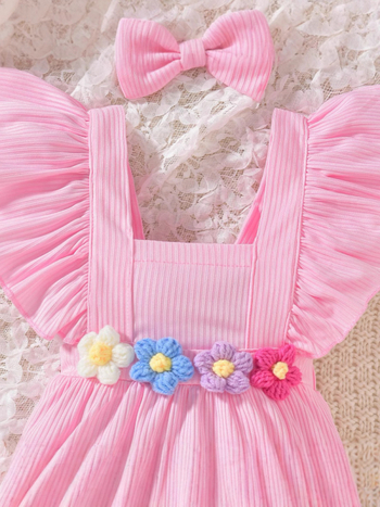 Lányoknak szóló, ujj nélküli kötött overál virágos vállpántokkal, dupla gombos zárás, 95% poliészter, 1–3 éveseknek (80–100 cm)