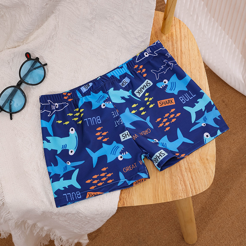 Berniukų plaukimo šortai su animaciniu piešiniu, laisvo kirpimo, poliesterio audinys su pamušalu, plaukiojimui.