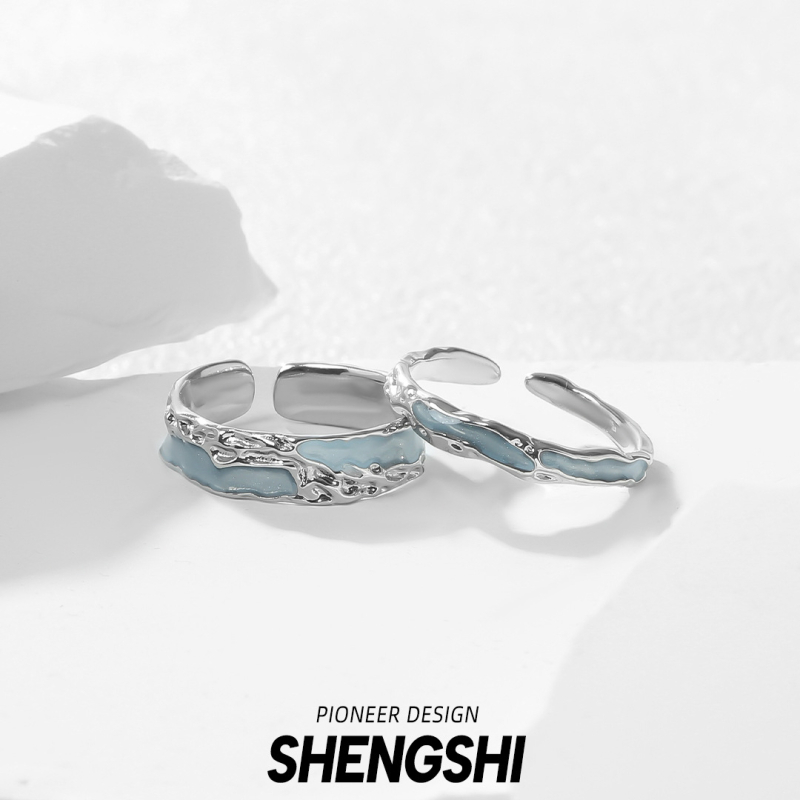 Rézből készült páros gyűrű, epoxid textúra, hullám- és geometriai mintázat, elektroplatált felület.