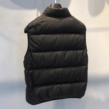 Пухена жилетка унисекс, пълнеж патеши пух 85–90%, външен плат: найлон, подплата: найлон, стояща яки, цип, за есен и зима