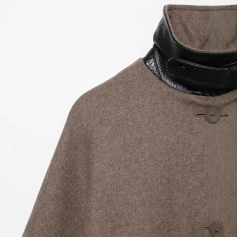 Ženski windbreaker kaput s jednim kopčanjem, srednje duljine, dugi rukavi, opuštenog kroja