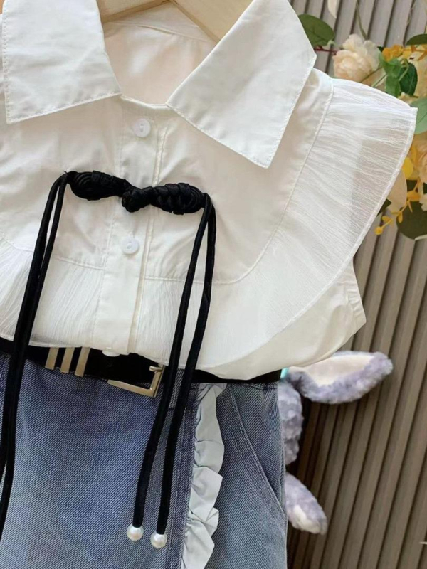 Σετ δύο τεμαχίων για κορίτσια σε στυλ πριγκίπισσας: χωρίς μανίκια τοπ με δαντελωτό denim culottes; Μείγμα βαμβάκι-πολυεστέρα (70% πολυεστέρας); Μονόχρωμο σχέδιο; Για ηλικίες 3–8 ετών; Άνοιξη-Καλοκαίρι 2024