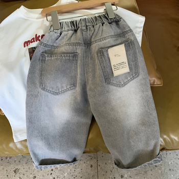 Gyerekeknek készült koreai stílusú farmernadrág Cowboy denim, 80% pamut, középmagas derék, egyszínű minta