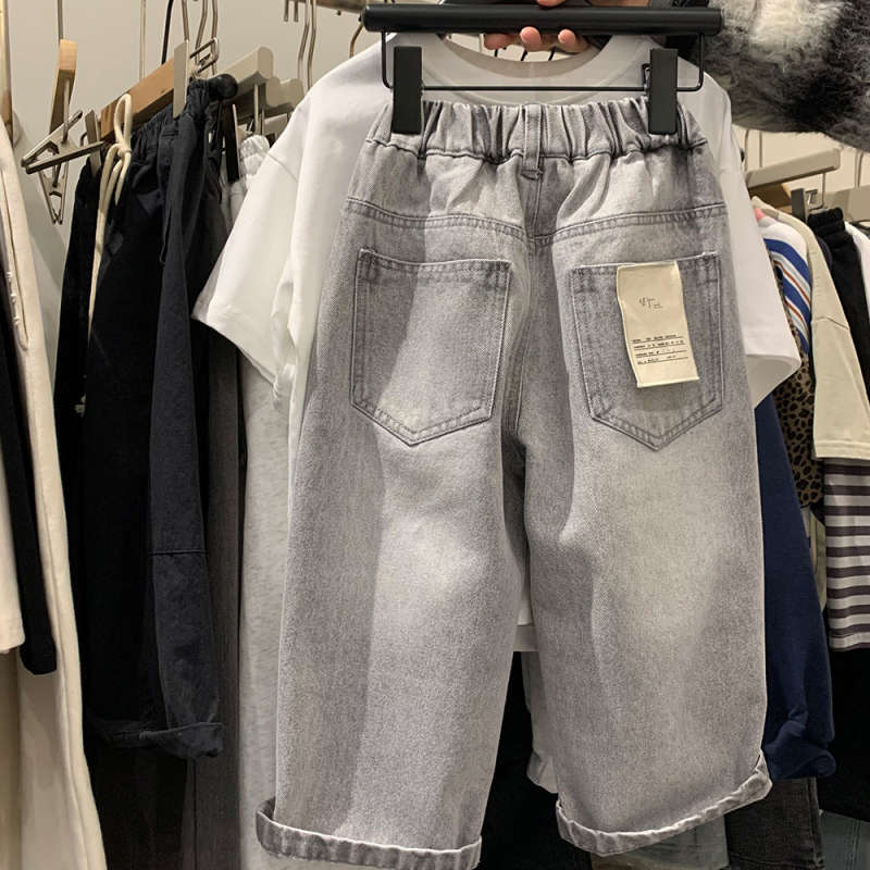 Gyerekeknek készült koreai stílusú farmernadrág Cowboy denim, 80% pamut, középmagas derék, egyszínű minta