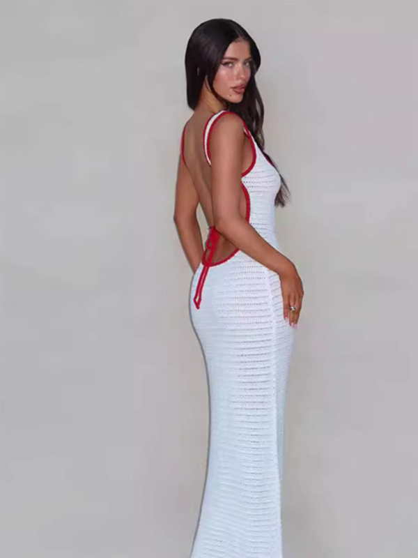 Haljina s halterom i otvorenim leđima, tijelo-prilegnog kroja, poliester materijal, uzorak biljaka i cvijeća