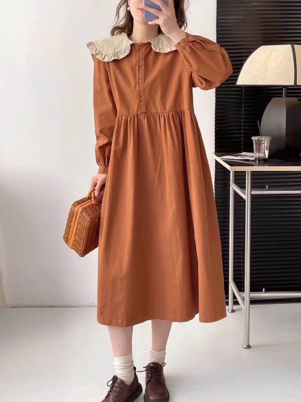 Haljina od pamukovo-mješovitog materijala, jednobojni uzorak, reverni ovratnik, dugi rukavi, A-linijski kroj