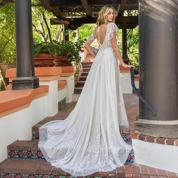 Дантелена сватбена рокля с малък шлейф, силует висока талия, 3/4 ръкави, дълга пола, полиестер 70–80%