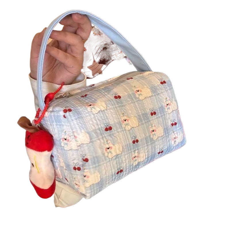 Kozmetička torbica, trokutasti oblik, model 985, netkana tkanina, japanski stil