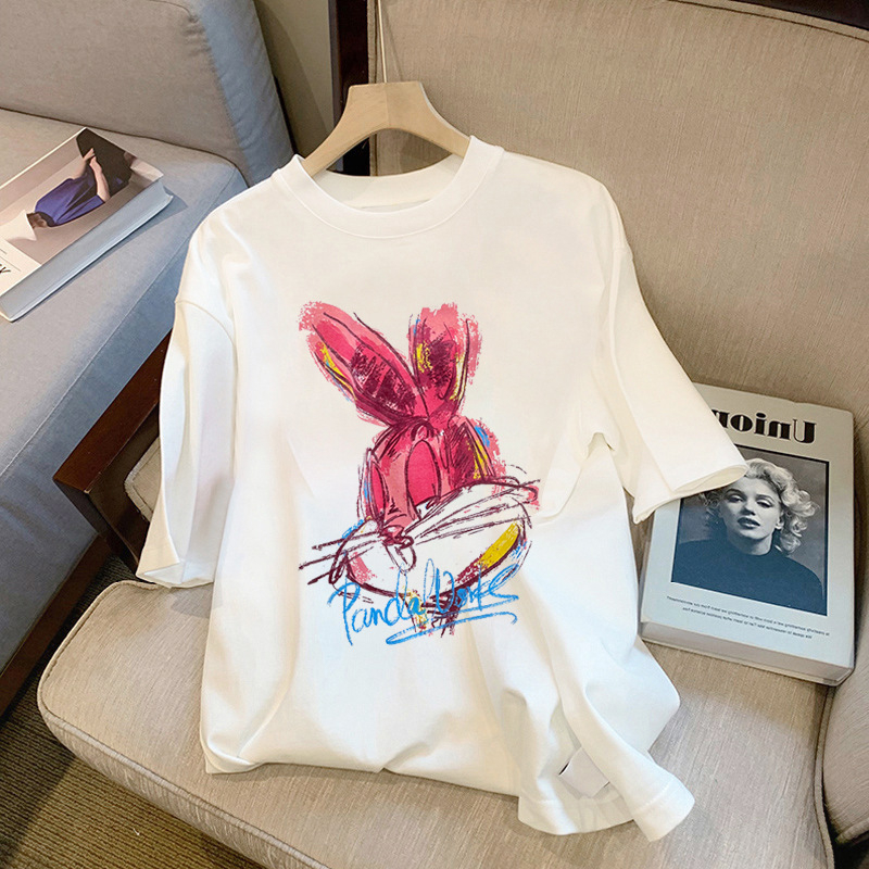 Unisex pamukasta T-majica s kratkim rukavima, okrugli izrez, slobodan kroj, tekstni uzorak.