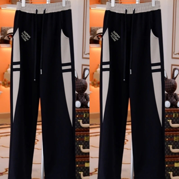 Ανδρικά casual χαλαρά παντελόνια από βαμβακοπολυεστερική μίξη, με μεσαία μέση, κλείσιμο με κορδόνι, μοτίβο με γράμματα