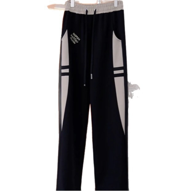 Ανδρικά casual χαλαρά παντελόνια από βαμβακοπολυεστερική μίξη, με μεσαία μέση, κλείσιμο με κορδόνι, μοτίβο με γράμματα