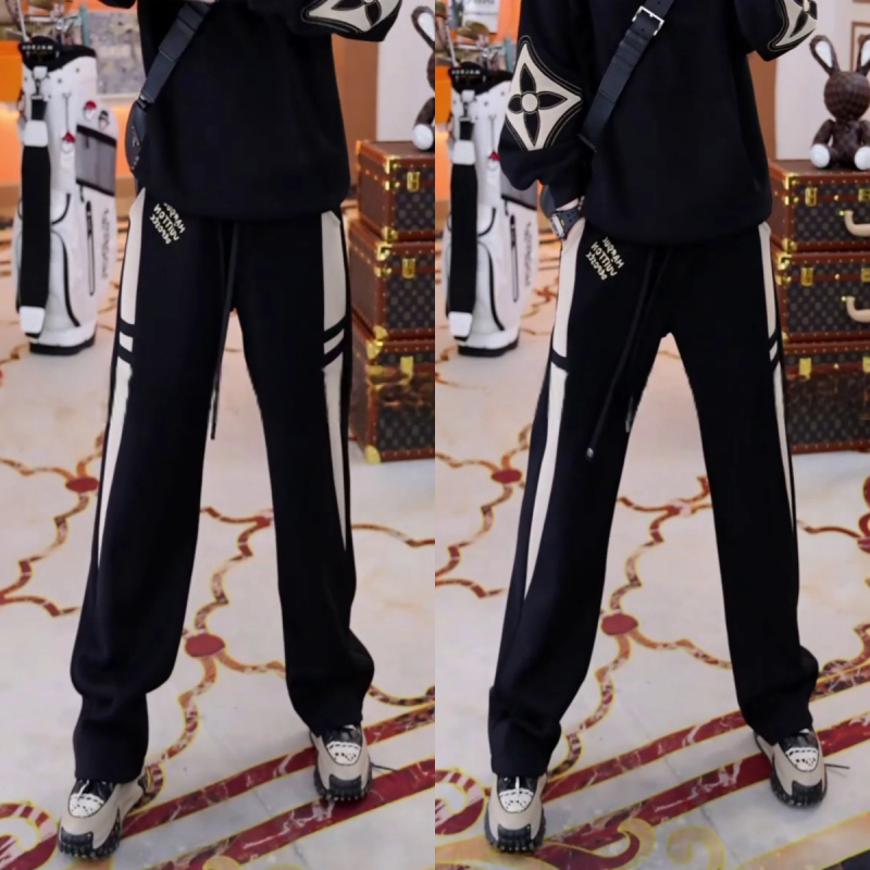 Ανδρικά casual χαλαρά παντελόνια από βαμβακοπολυεστερική μίξη, με μεσαία μέση, κλείσιμο με κορδόνι, μοτίβο με γράμματα