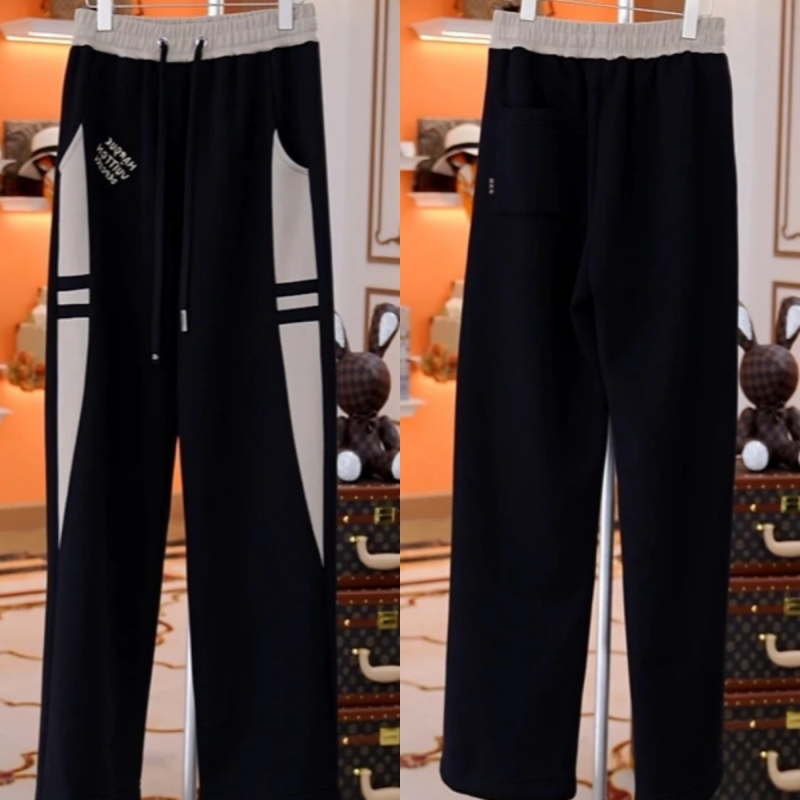 Ανδρικά casual χαλαρά παντελόνια από βαμβακοπολυεστερική μίξη, με μεσαία μέση, κλείσιμο με κορδόνι, μοτίβο με γράμματα