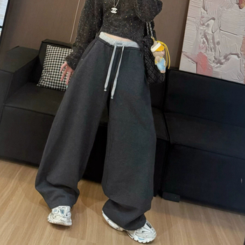 Дамски свободни панталони от синтетична кожа — естествена талия, дълги до пода, асиметричен градски стил