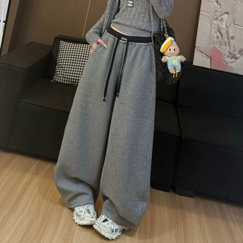 Дамски свободни панталони от синтетична кожа — естествена талия, дълги до пода, асиметричен градски стил