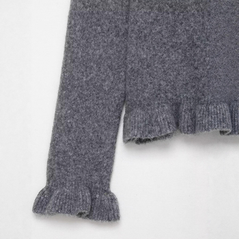 Uski pulover s ovratnikom lapel, jednostavni prednji zatvarač, dugi rukavi