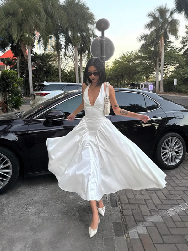 Haljina s halter izrezom V, bez rukava, visokim strukom